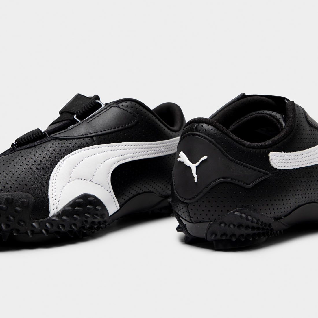 PUMA Women's Mostro Perf Black / White